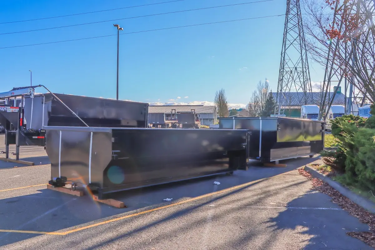 Roll-off dumpster ready for waste disposal at job site for 2 Yard Dumpster Rental in Collierville